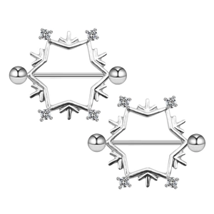 Close-up of silver snowflake nipple rings with small diamond accents on white background