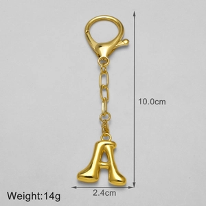 Detailed view of gold 18k plated letter A keychain with dimensions and weight
