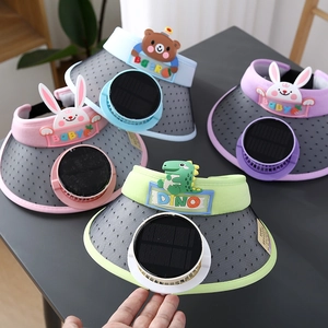 Close-up of kids' sun hats with built-in solar fans and cute 3D cartoon animal designs