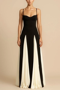 Detail of the slim fit dress featuring a contrast beige pleated chiffon hem design