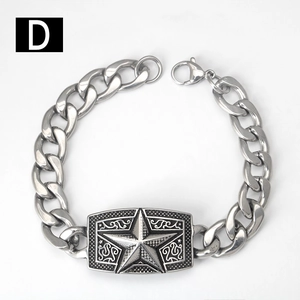 Detailed macro view of silver stainless steel Cuban chain bracelet with star engraved plate
