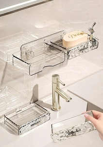 Close-up of wall-mounted soap dish with wave texture and drawer separation design