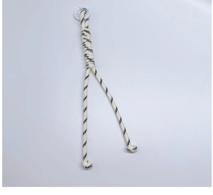Detail of hand-woven cream cord with black accents and white ring for bags and keys
