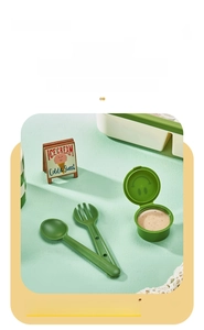 Forest green lunch box accessory set with fork spoon and mini sauce container
