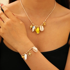 Bohemian seashell and starfish pendant jewelry set with woven rope for beach vacations