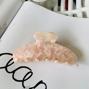 Pink and white marbled acetate hair claw clip with large shark clip design for women