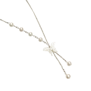 Elegant silver butterfly pendant necklace with white pearls on a minimalist background