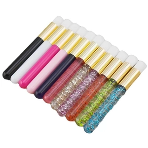 Set of 10 eyelash and nose pore cleaning brushes with colorful glitter handles and soft bristles