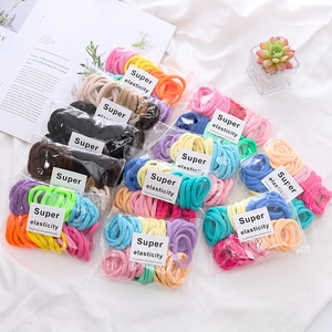 50-piece set of seamless high elasticity macaron color hair ties in clear packaging