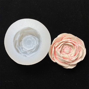 3D poppy flower silicone mold with pink gradient resin casting on black background