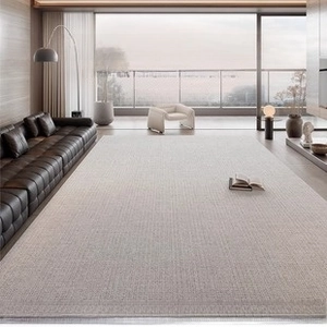 Close-up of cream waterproof living room rug with a dense cross-woven texture and neat edges