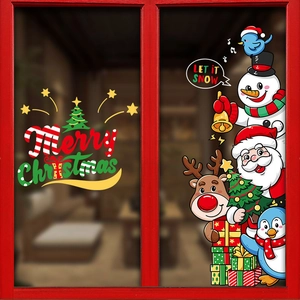 Detailed close-up of cartoon Christmas window stickers with Santa, reindeer and snowmen