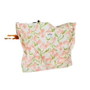 Floral canvas tote bag with pink flowers and green leaves on cream fabric