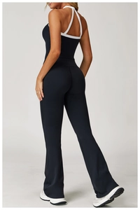 Detail showing high-waist yoga flare pants and halter top with contrast white piping