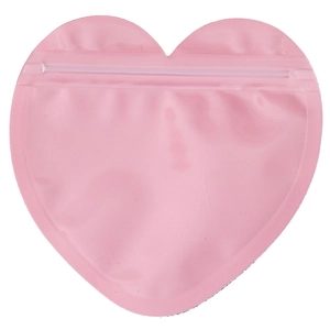 Pink heart-shaped resealable storage bag with transparent zip lock on white background
