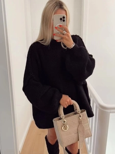 Women's minimalist black oversized round neck knit sweater with vertical texture