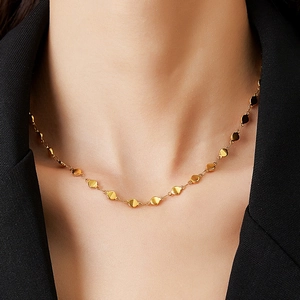 Minimalist 18K gold plated stainless steel necklace with round disc chain on a model