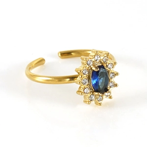 Adjustable stainless steel sun flower ring with blue oval stone and sparkling crystal accents