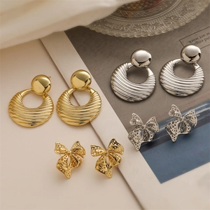Vintage Hollow Bow Earrings Copper Plated Gold Geometric Wavy Texture Retro Style Fashion Accessory For Women