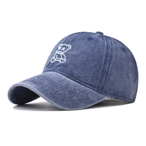 Deep blue washed cotton baseball cap with embroidered cartoon bear and street style