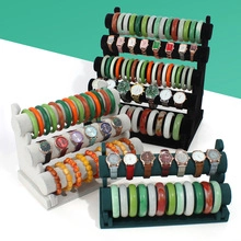 Three-tier velvet display stands for bracelets and watches in black, gray, and dark green