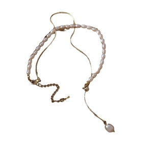 Baroque freshwater pearl necklace with gold chain splice and elegant pearl pendant