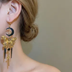 Boucles d'oreilles vintage papillon doré avec croissants de lune noirs et croix pendante