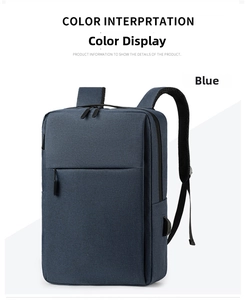 Detail of blue business backpack showing side USB port and durable fabric texture