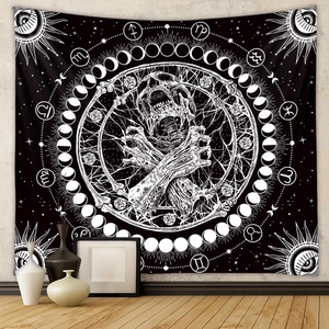 Gothic skull tapestry with moon phases and zodiac signs on black background in bedroom