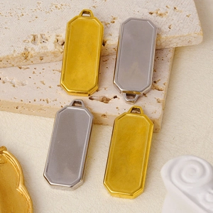 Detailed view of rectangle 304 stainless steel pendants in gold and silver finishes