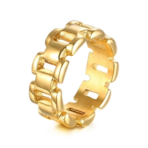Close-up detail of golden chain link ring with a retro watchband style aesthetic