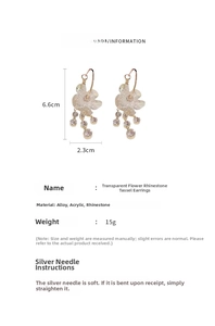 Detail view of flower rhinestone tassel earrings with 6.6cm x 2.3cm dimensions