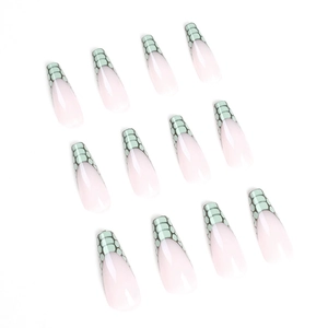 Pink French long coffin press-on nails featuring green crocodile skin texture accents