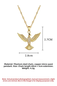 Detail of gold bird pendant necklace with zircon pavé and dimensions 2.7x2.8cm