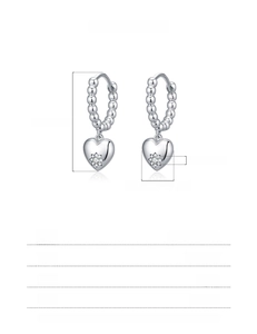 Detailed view of 925 sterling silver heart earrings with beaded hoops and zircons