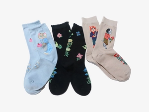 Detail view of floral and cartoon cat jacquard patterns on colorful cotton ankle socks