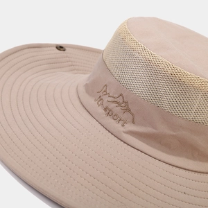 Detail view of khaki sun hat featuring breathable mesh crown and ig-sport logo embroidery