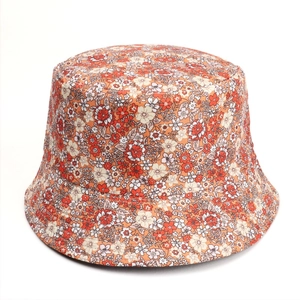 Detail of floral print bucket hat with intricate flower patterns and quality stitching