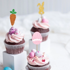 Glittery Easter cupcake toppers featuring rabbit, carrot and egg shapes on white stands