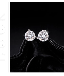 Close-up of 1ct moissanite stud earrings with classic 3-prong s925 silver setting