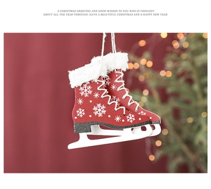 Macro detail of red wooden Christmas skate ornament with white snowflake and fur trim