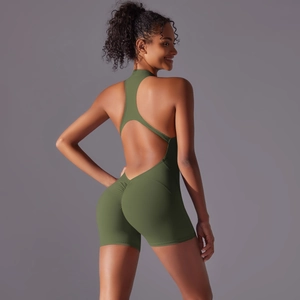 Detailed back view of avocado green yoga bodysuit featuring open back and ruched booty detail