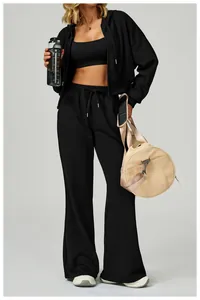 Detailed view of women's black 3-piece sportswear set with drawstring sweatpants