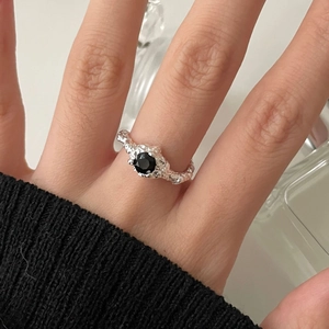 S925 sterling silver open ring featuring a black crystal and irregular lava texture finish