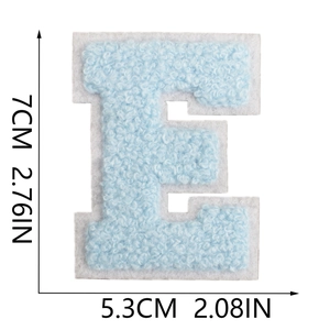 Detail of light blue towel embroidery patch letter E with 7cm height dimensions
