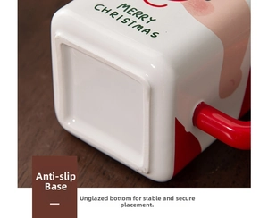 Detail of the non-slip unglazed bottom of the square ceramic Santa Christmas mug