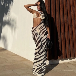 Detailed close-up of zebra print fabric on this sexy two-piece summer vacation dress set