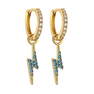 Detail of 18K gold lightning drop earrings with blue stones and white zircon crystals