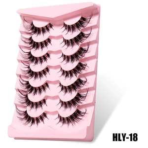 Detail view of 7 pairs of Fox-eye false eyelashes in style HLY-18 on a pink tray
