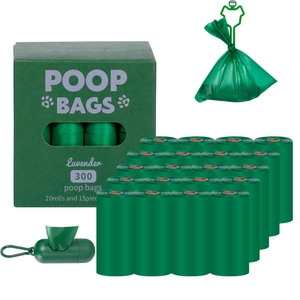 Comprehensive set of eco-friendly green dog poop bags with dispenser and packaging box.